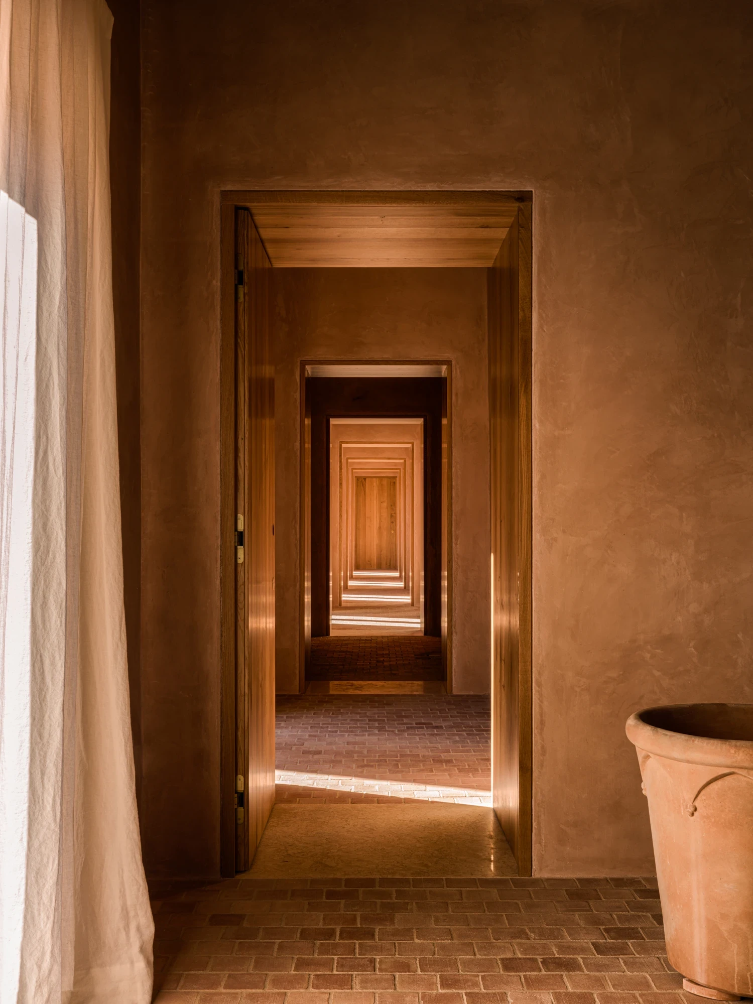 Nested doorways through earthen walls