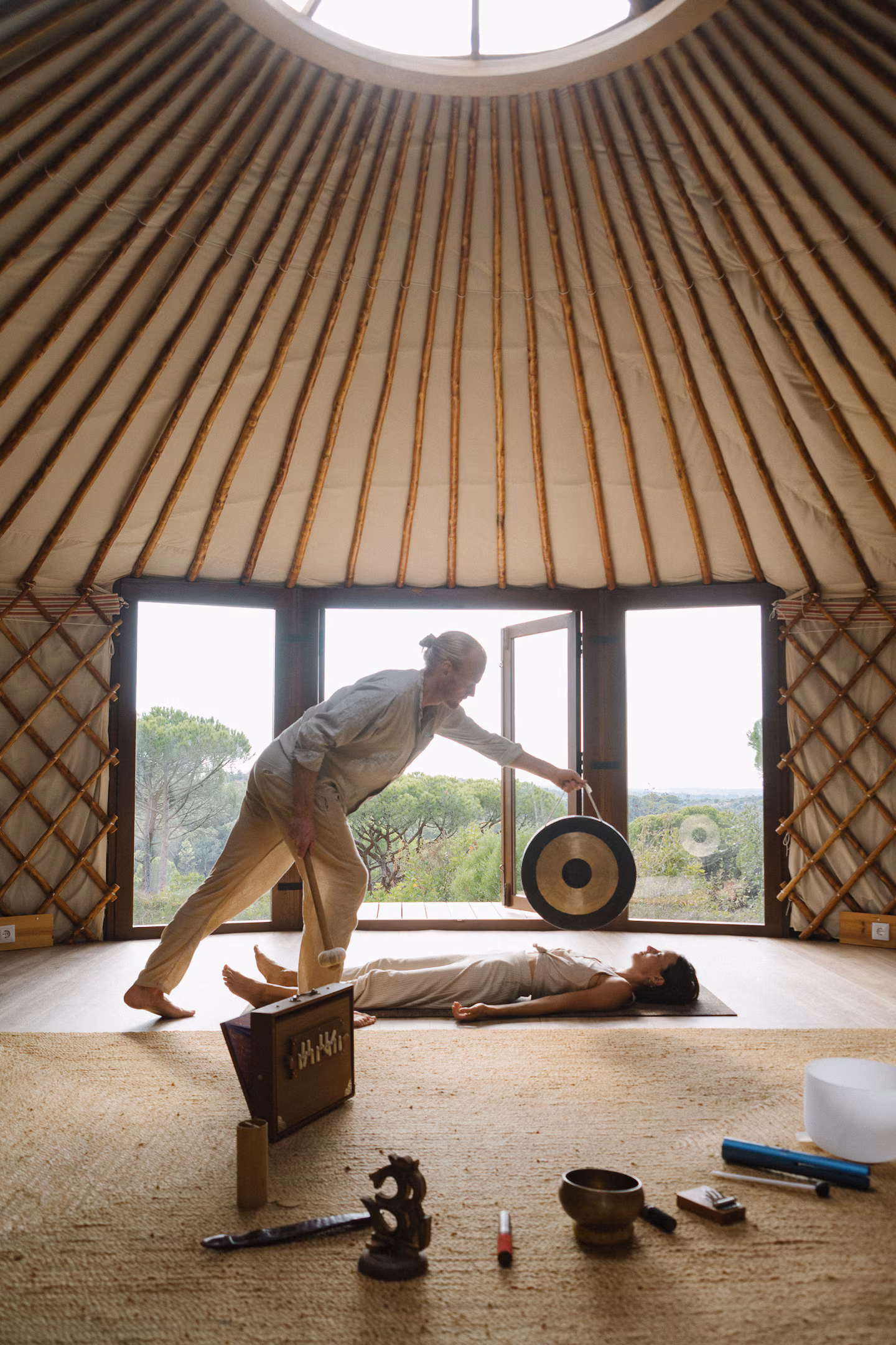 Sound bath with gong inside the yurt