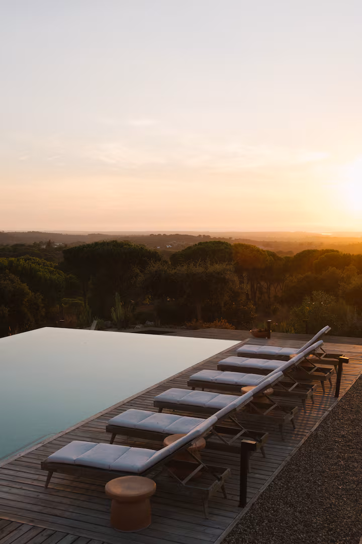Loungers above the landscape at dusk